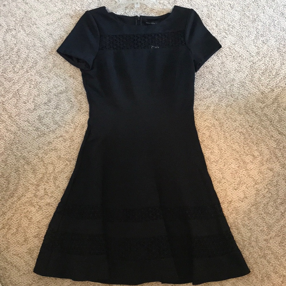 Black, fit and flare zip-up dress.